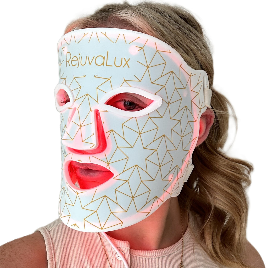 RejuvaLux flexible silicone LED face mask lit red on neutral background
