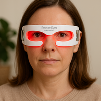 Person wearing RejuvenEyez eye rejuvenation  mask with red LED light 